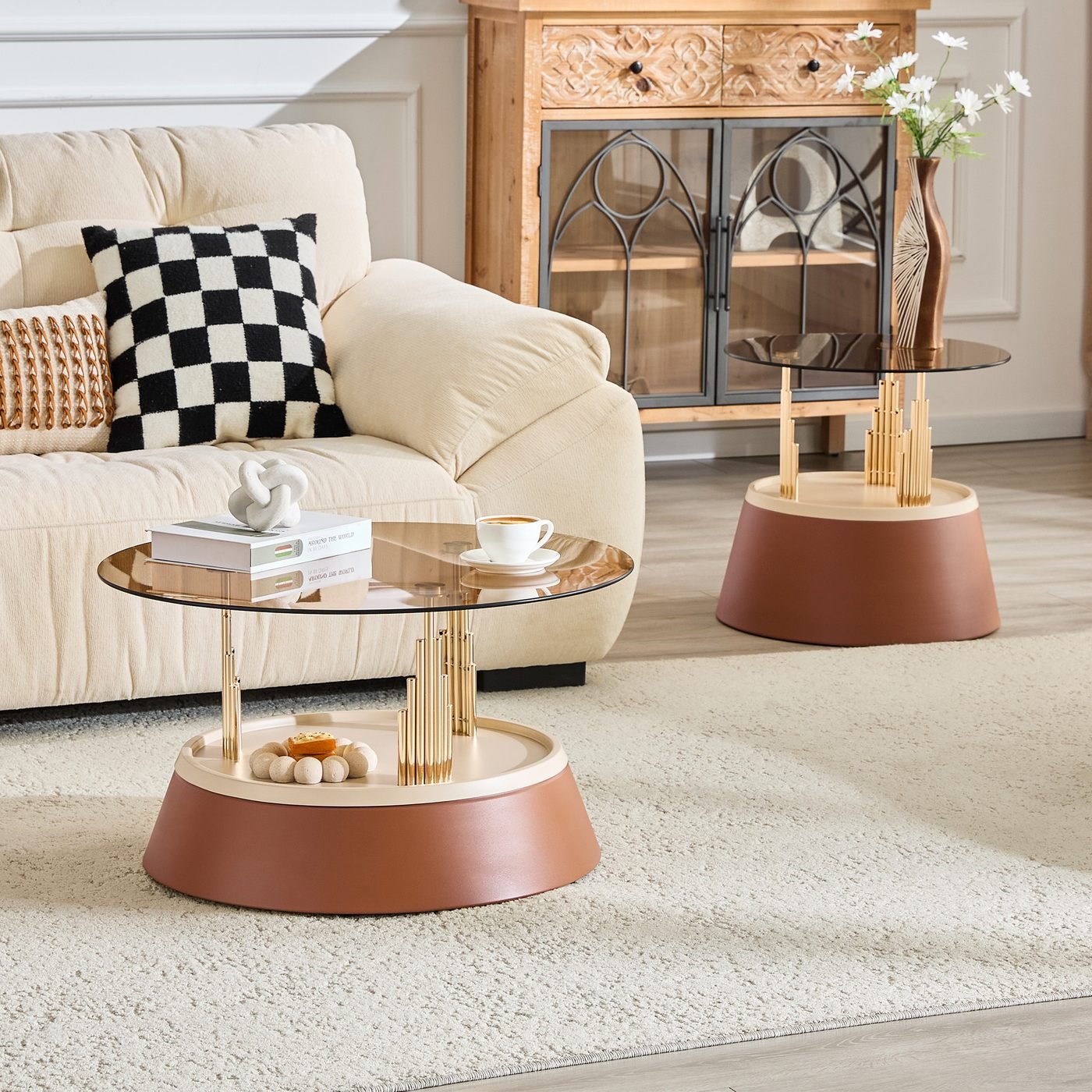 Luxury-inspired brown and gold nesting coffee table set.