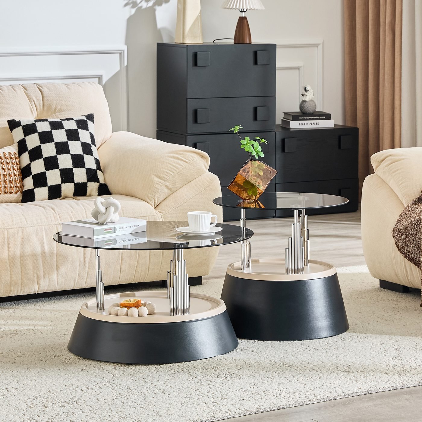 Affordable luxury black nesting coffee table set.