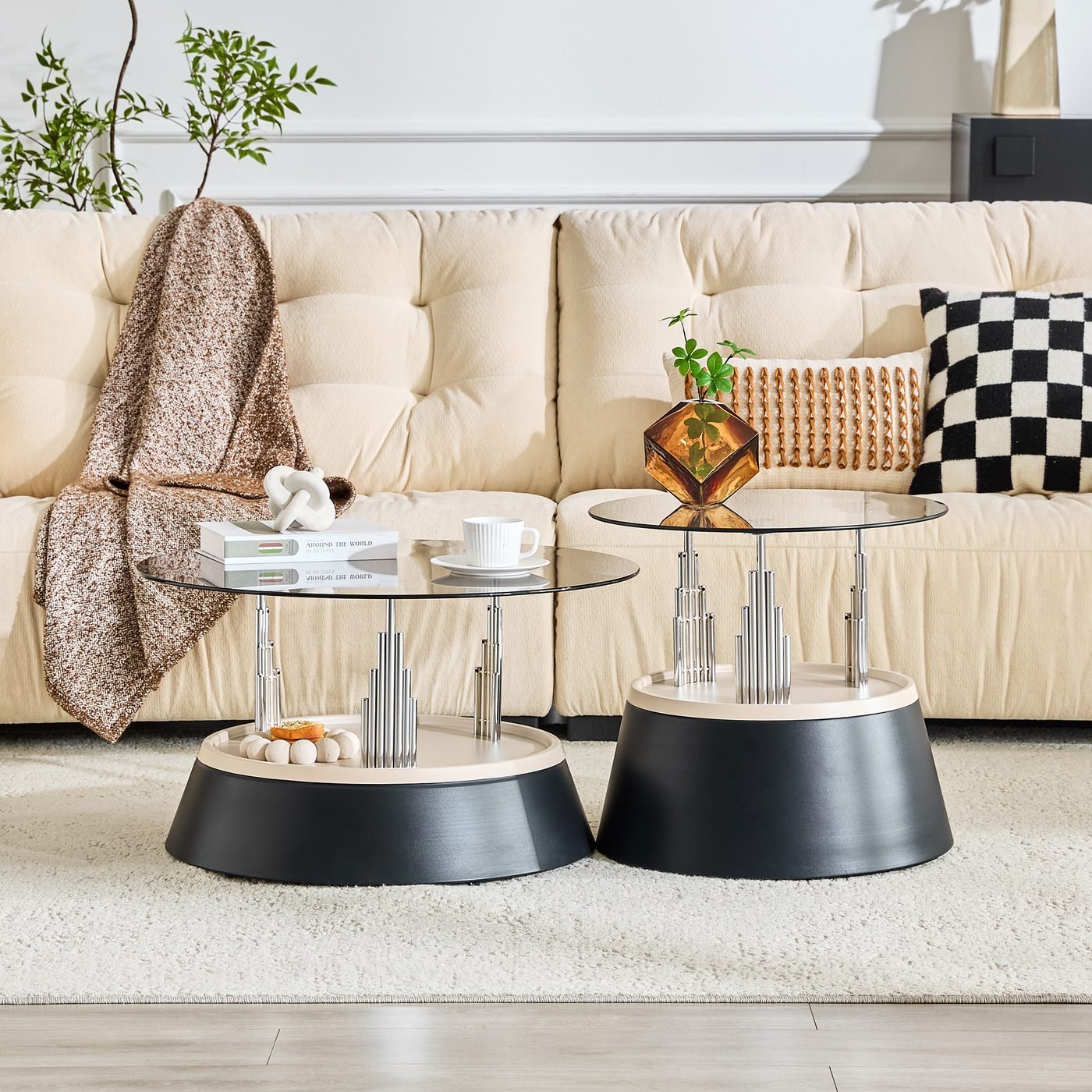 Affordable luxury black nesting coffee table set.